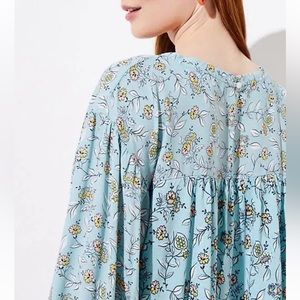 Loft aqua cloud floral balloon sleeves back key hole . Size Large